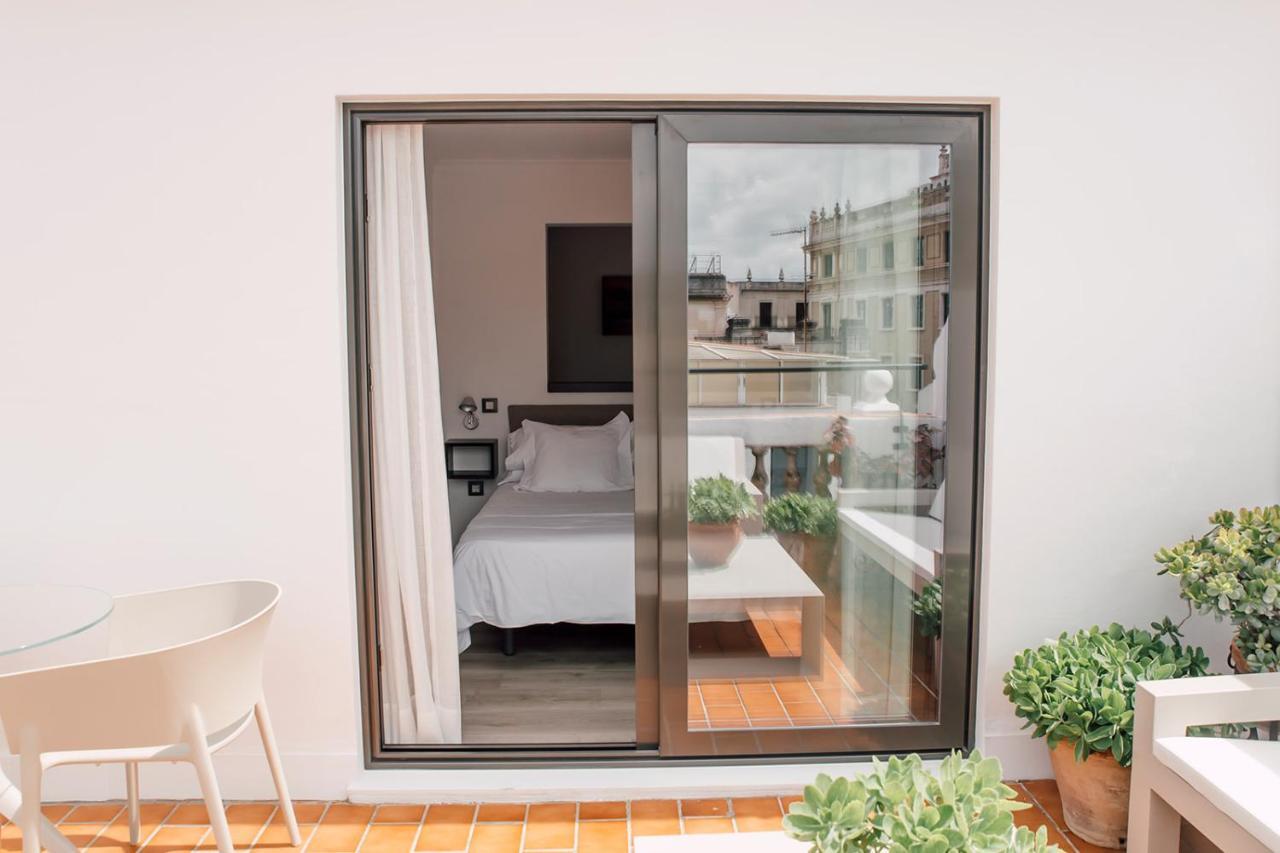 Puerta Catedral Holiday Suites Sevilla Exterior foto